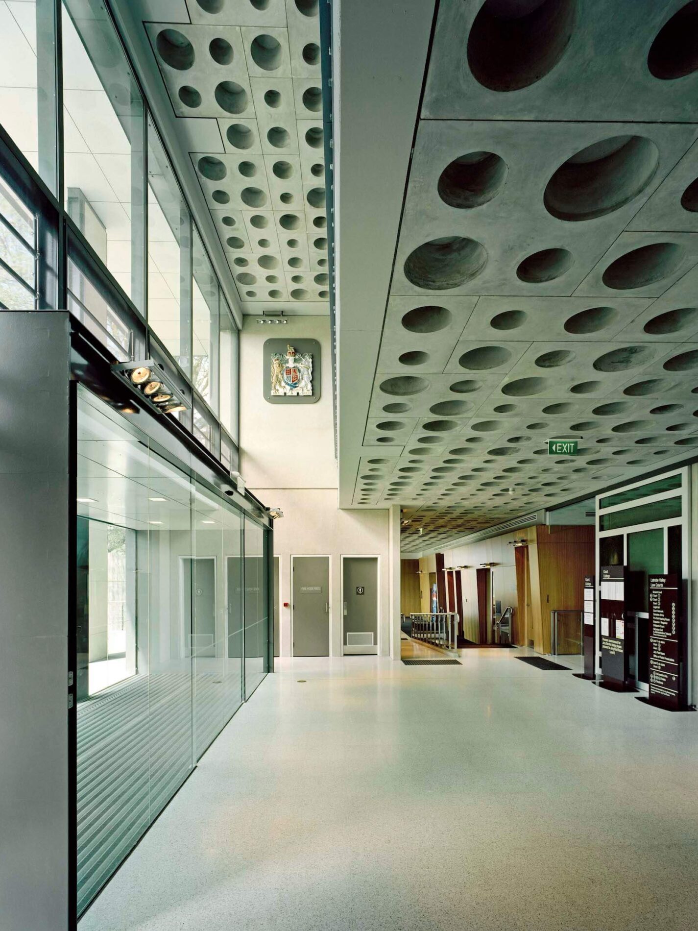 Waffle pod slab stepped ceiling in law contemporary court lobby