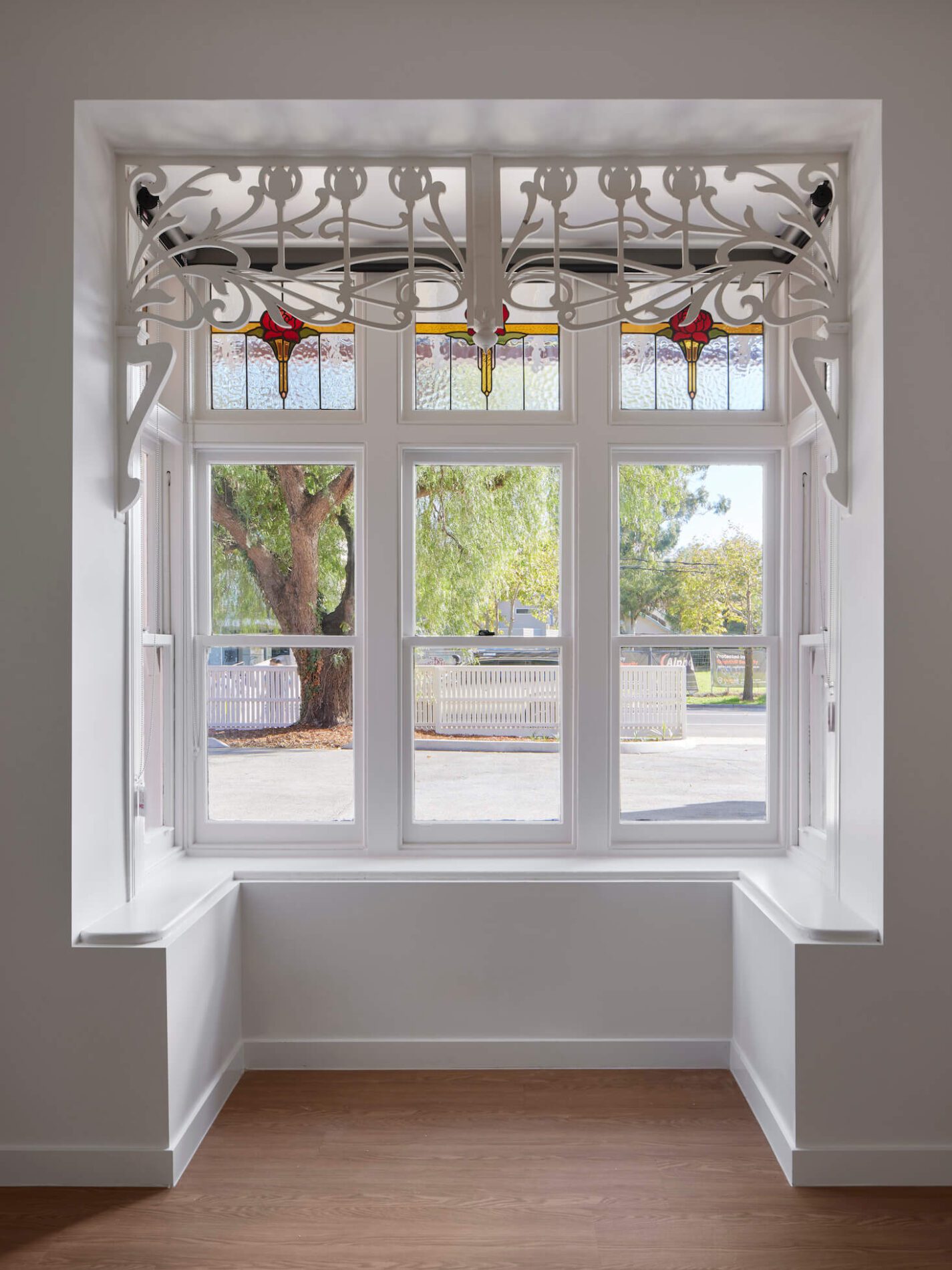 Box bay window with stained glass and internal fretwork