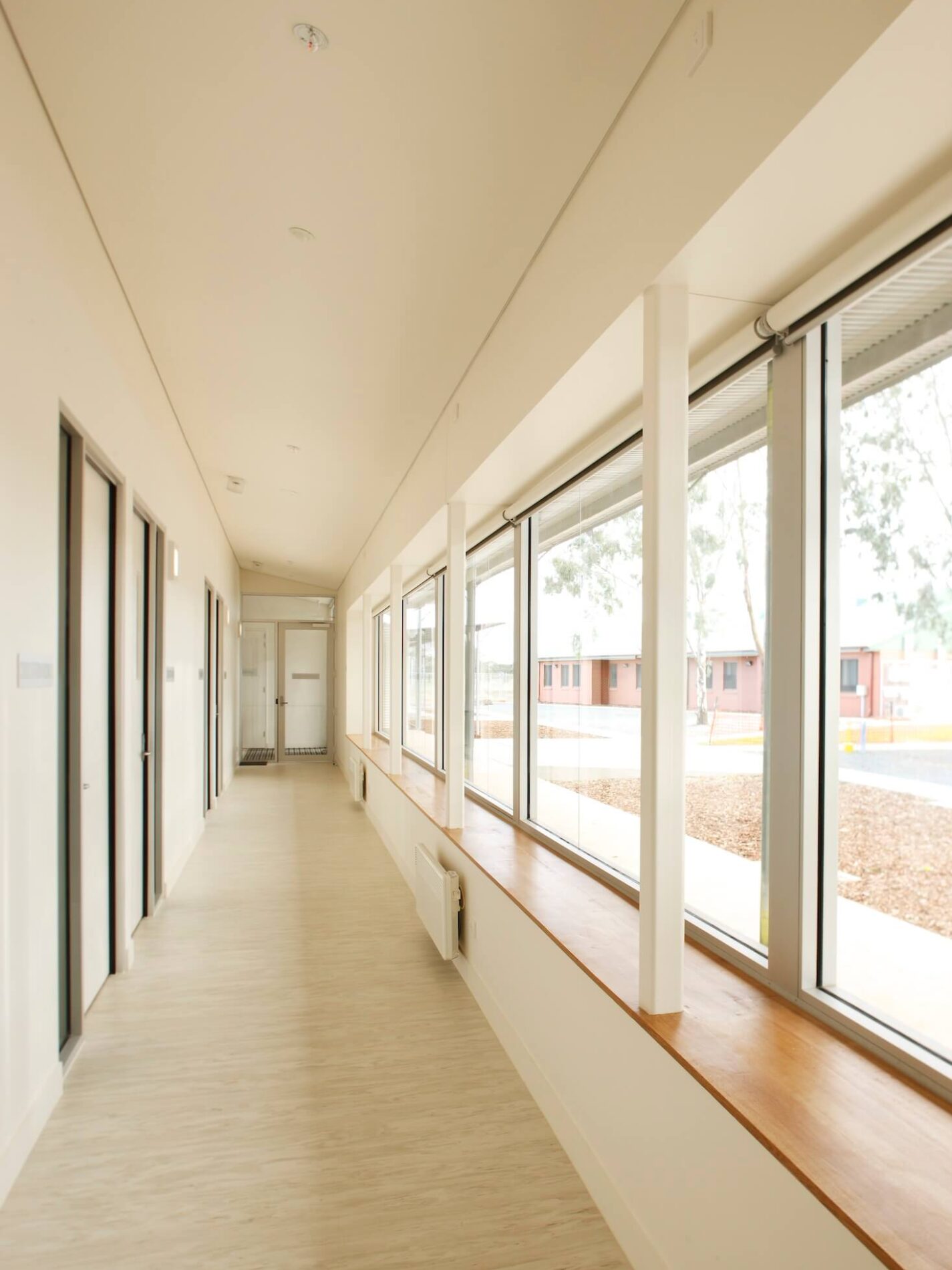 Institutional hallway with timber windowseat