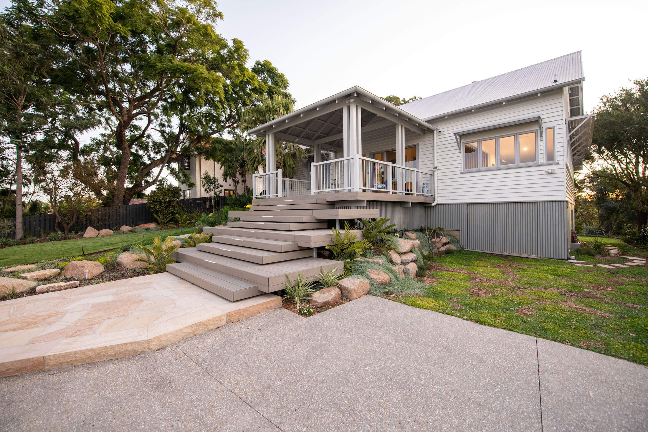 Queenslander with steps leading to landscaping