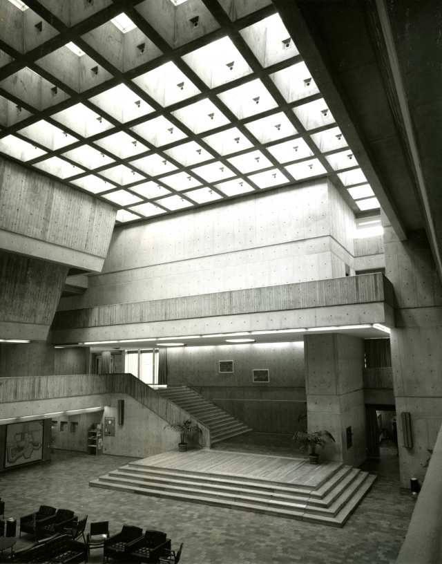 Brutalist building with recessed waffle high ceilings as large meeting space